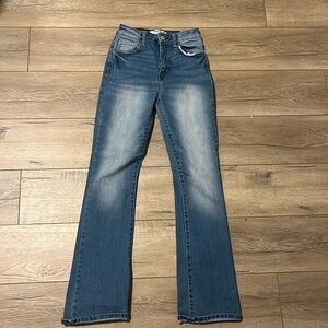 Bootcut blue denim jeans size 1/25 
Worn and have paint stain on back